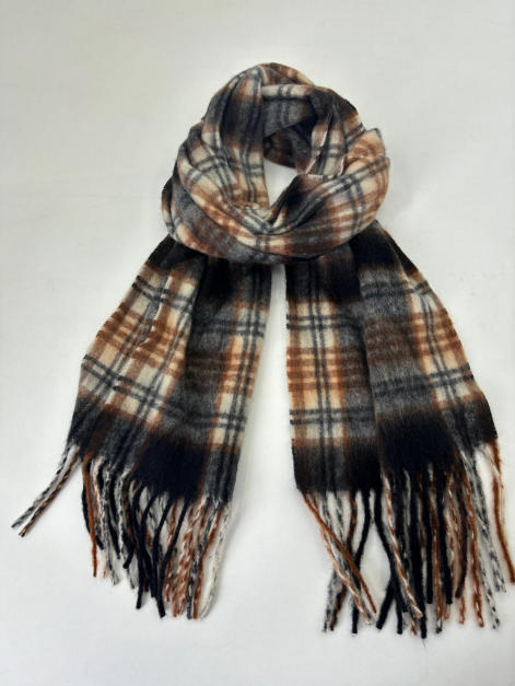 Coiled plaid scarf in brown, cream, and charcoal with long fringe ends, laid flat on white background