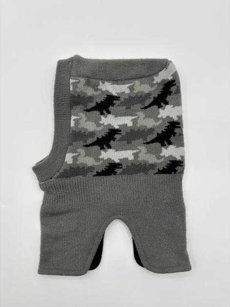 Grey knit balaclava laid flat showing black white grey camouflage jacquard pattern on front panel with ribbed edges