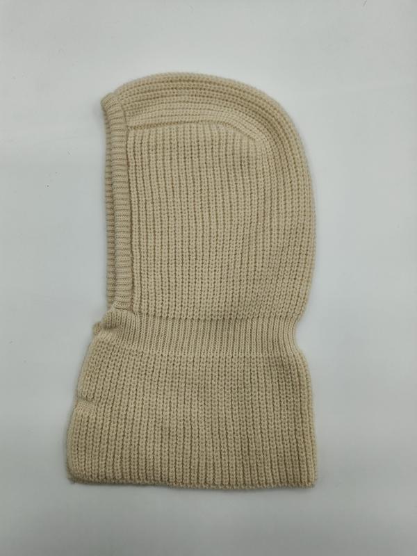 Cream ribbed knit balaclava ski mask laid flat on white background, full face coverage winter hood