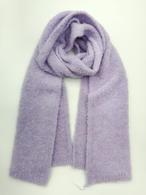 Soft lavender purple boucle knit oversized scarf looped and laid flat on white background
