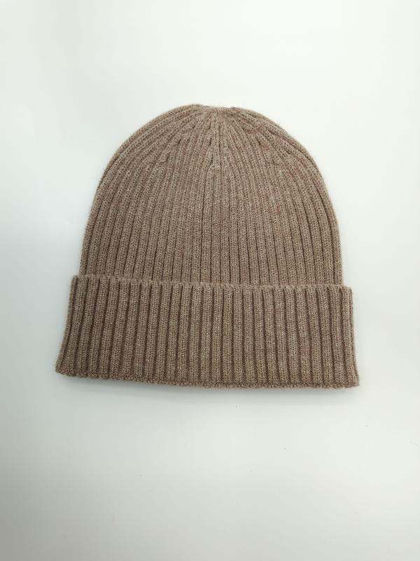 Flat lay of a taupe ribbed knit cuffed beanie hat on white background, showing fine rib texture and folded brim